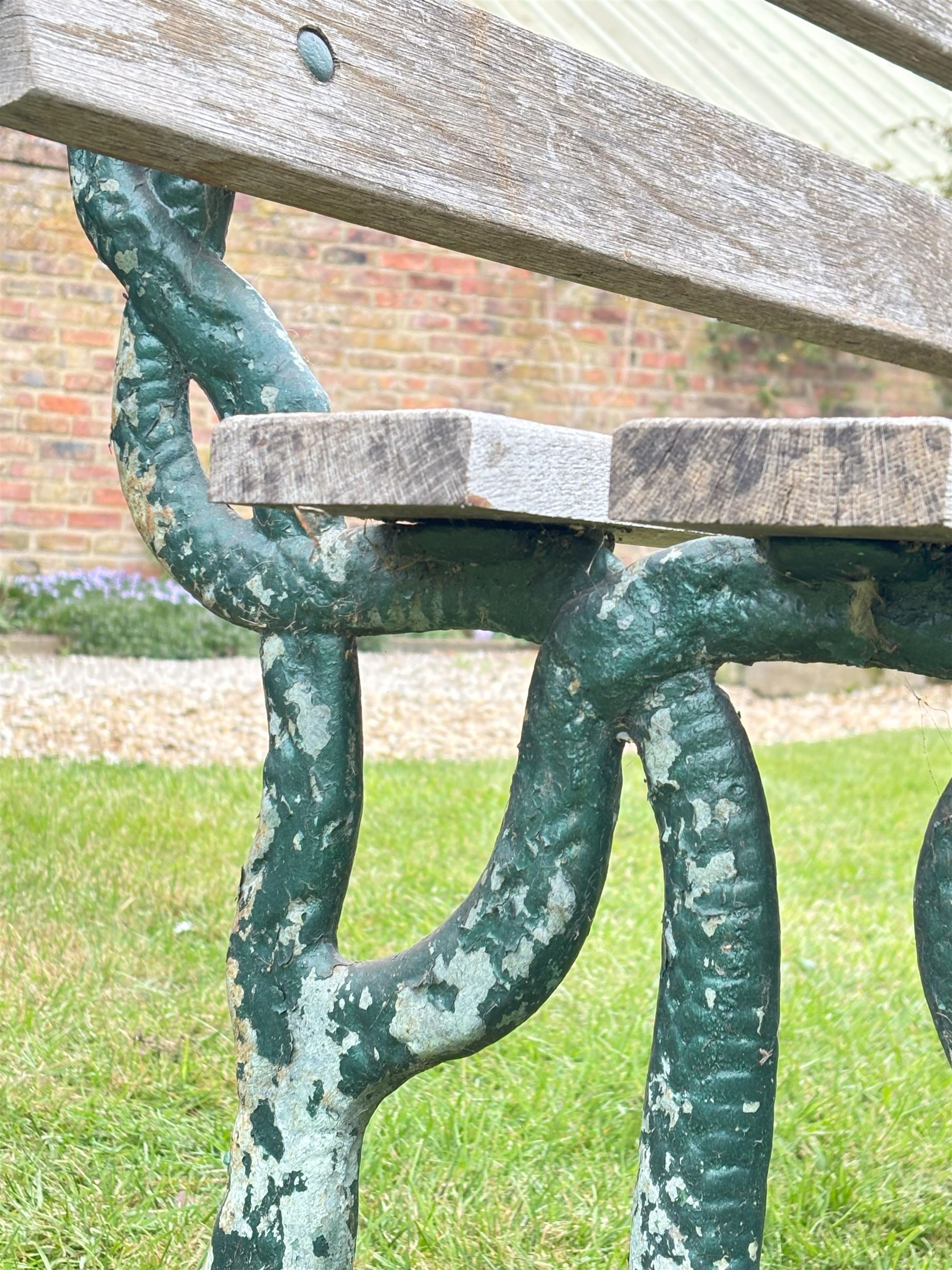 Carron pattern snake end garden bench with teak slats. L144cm, H80cm, D50cm.  - COLLECTION BY APPOINTMENT FROM: The White House, Thirsk Road, Easingwold, York, YO61 3NF - CALL 01723 507111 TO ARRANGE