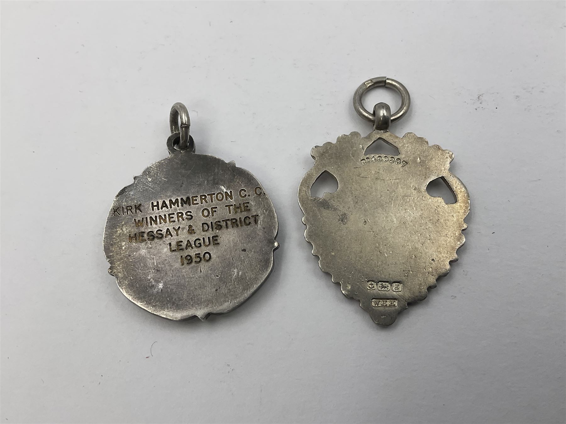 Ten early 20th century silver cartouche fobs, to include a Yorkshire Rose example, all hallmarked with various dates and makers
