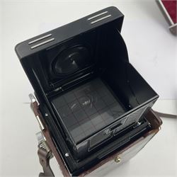 Yashica-Mat Copal MXV camera body, serial no 408717, with Yashinon 1;3.2 f=80mm' and Yashinon 1;3.5 f=80mm' lens serial no 460802, together with Yashica 635 Copal-MXV camera body serial 4080675 with Yashinon 1;3.5 f=80mm' lens serial no 229427 and 'Yashikor 1;3.5 f=80mm' lens serial no 228386