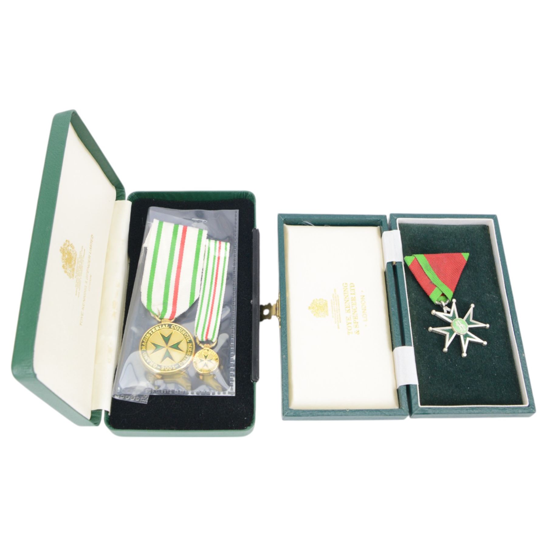 Military and Hospitaller Order of St. Lazarus of Jerusalem, Knight of Grace, collection of jewels, medals and other items, including breast badges, necklace, epaulettes, cloth badges etc, serval items in cases marked Tote, Kenning & Spencer Ltd 