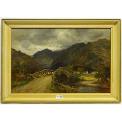 Owen Bowen (Staithes Group 1873-1967): Sheep crossing a Stone Bridge in the Lake District, oil on canvas signed and dated '07, 39cm x 60cm



