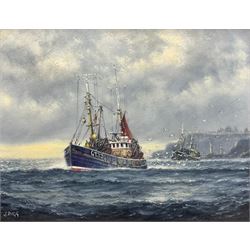 Jack Rigg (British 1927-): Grimsby Trawlers 'Off Whitby', oil on canvas signed, titled and dated 1994 verso 34cm x 45cm 
Provenance: with the Penny Hedge Gallery Whitby, label verso