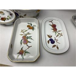 Royal Worcester Evesham pattern, including covered pot de cremes, twin handle tureen, serving dishes, flan dishes, side plates etc  