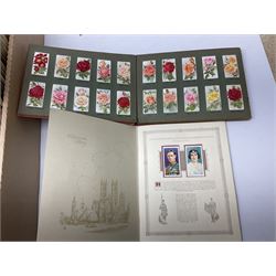 Quantity of cigarette and trade cards, housed in albums and loose, by W.D. & H.O. Wills, John Player & Sons etc, including cycling, garden hints, Britain's railways, dogs etc and various empty vintage cigarette card albums, in two boxes