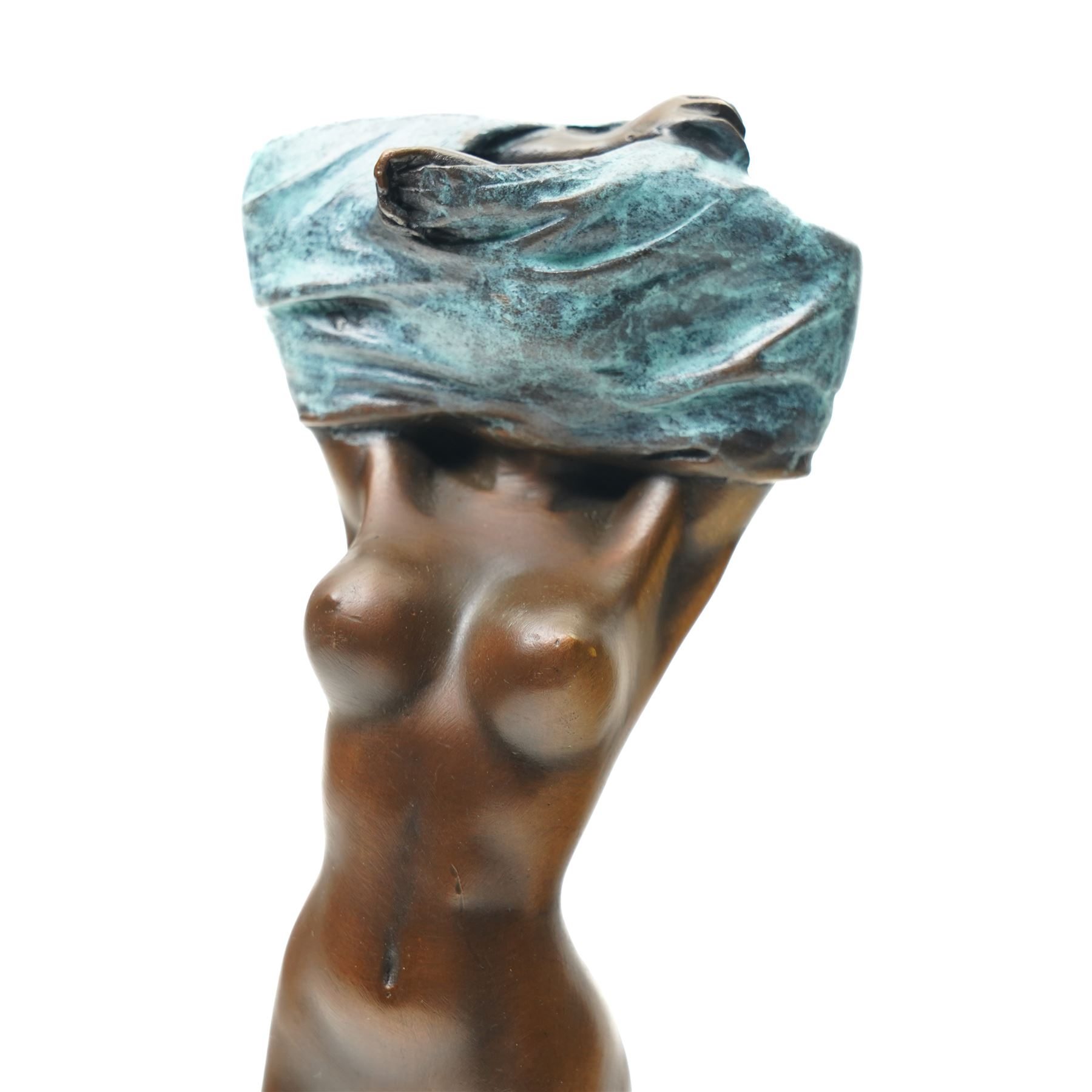 Bronze figure, modelled as a nude woman removing her shirt, signed Milo, H17cm