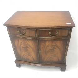 Reproduction Bevan Funnell mahogany serpentine front side cabinet, two drawers above two cupboards, shaped bracket supports, W75cm, H76cm, D49cm