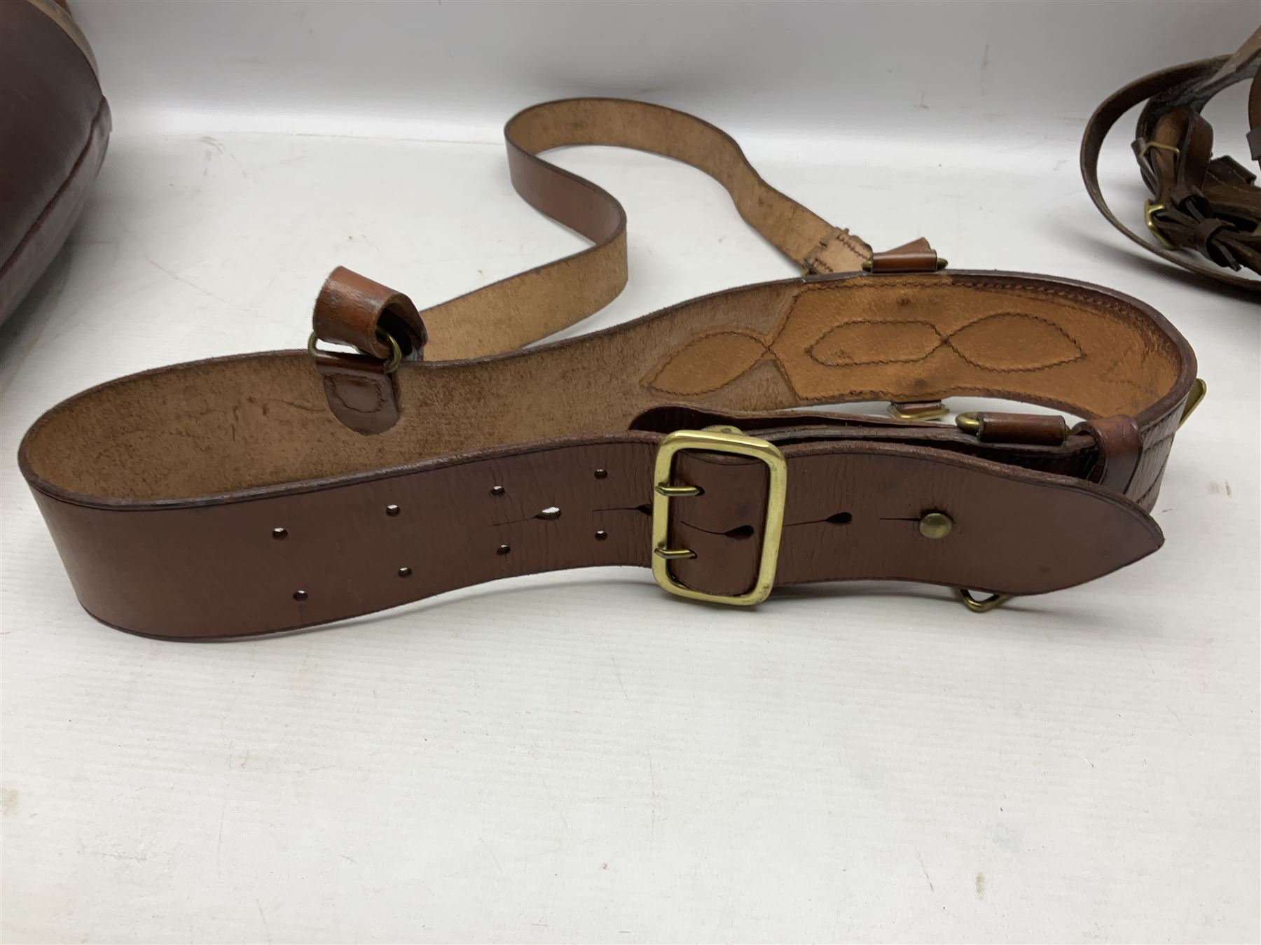 Pair of WW1 style Army Officer's brown leather full leg riding boots with Alkit four-piece wooden boot trees; and two officer's Sam Browne leather belts with cross-straps, one with sword frog (4)