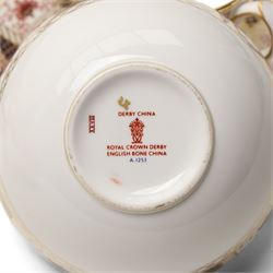 Royal Crown Derby 'Derby Border' pattern part tea service, comprising twelve teacups and saucers, twelve side plates, sandwich plate, milk jug and sugar bowl