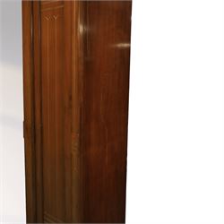 Aesthetic Movement walnut parcel gilt wardrobe, the crenellated top, above central mirrored door opening to reveal hanging space, four opened and two closed draws