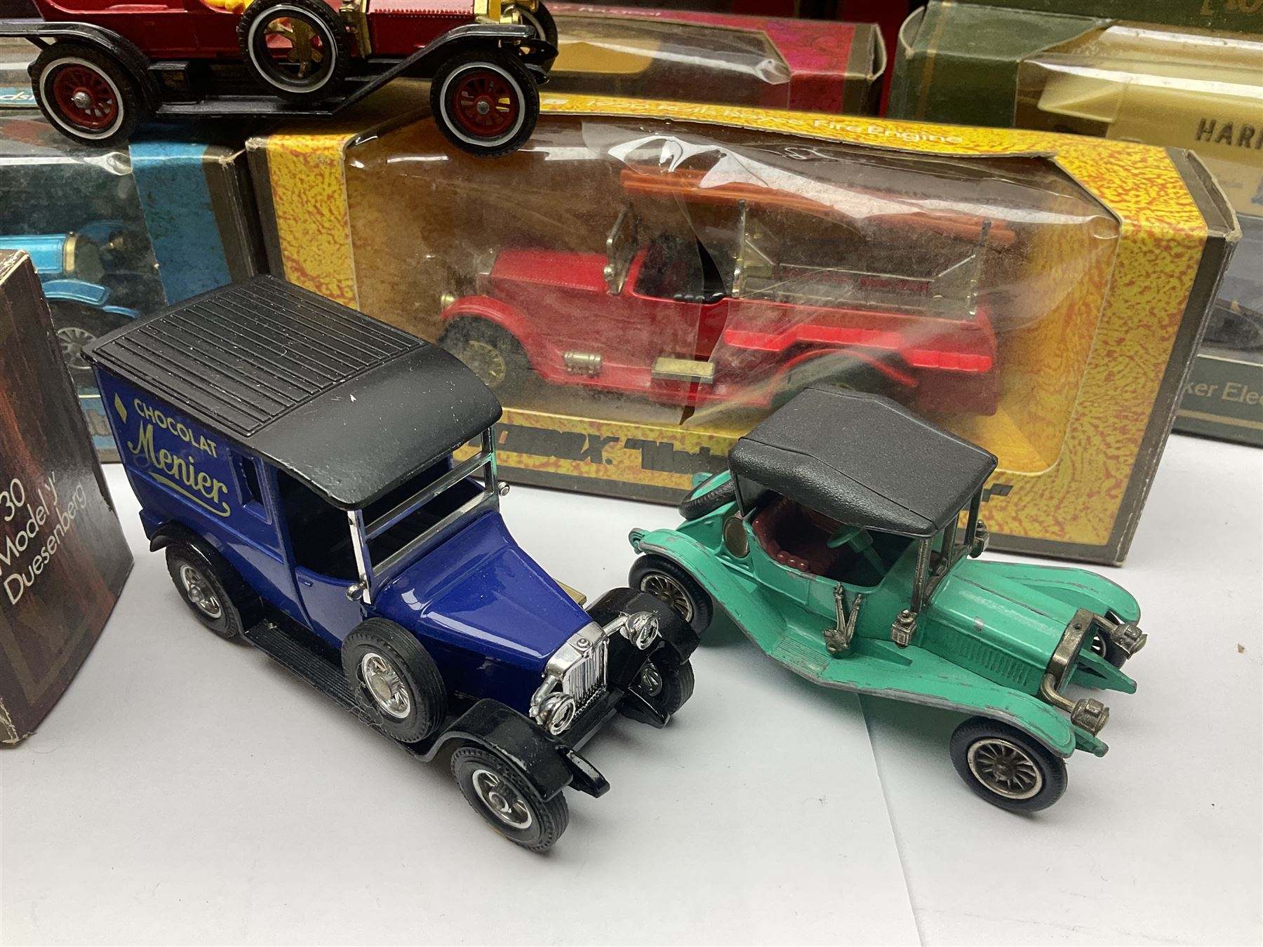 Matchbox - approximately sixty Models of Yesteryear to include special edition 1820 Passenger Coach and Horses, limited editions 1894 Aveling-Porter Steam Roller, 1829 Stephensons Rocket and 1905 Fowler Showman’s Engine; older models from the 1970s such as Y-1 1911 Model ‘T’ Ford, and a large quantity of modern models with reference materials in folder; mostly boxed 