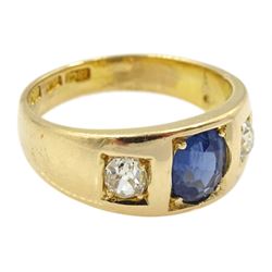 Late 19th century continental gypsy set three stone oval sapphire and old cut diamond ring, stamped 18ct, makers mark HA, total diamond weight approx 0.45 carat, sapphire approx 1.05 carat
