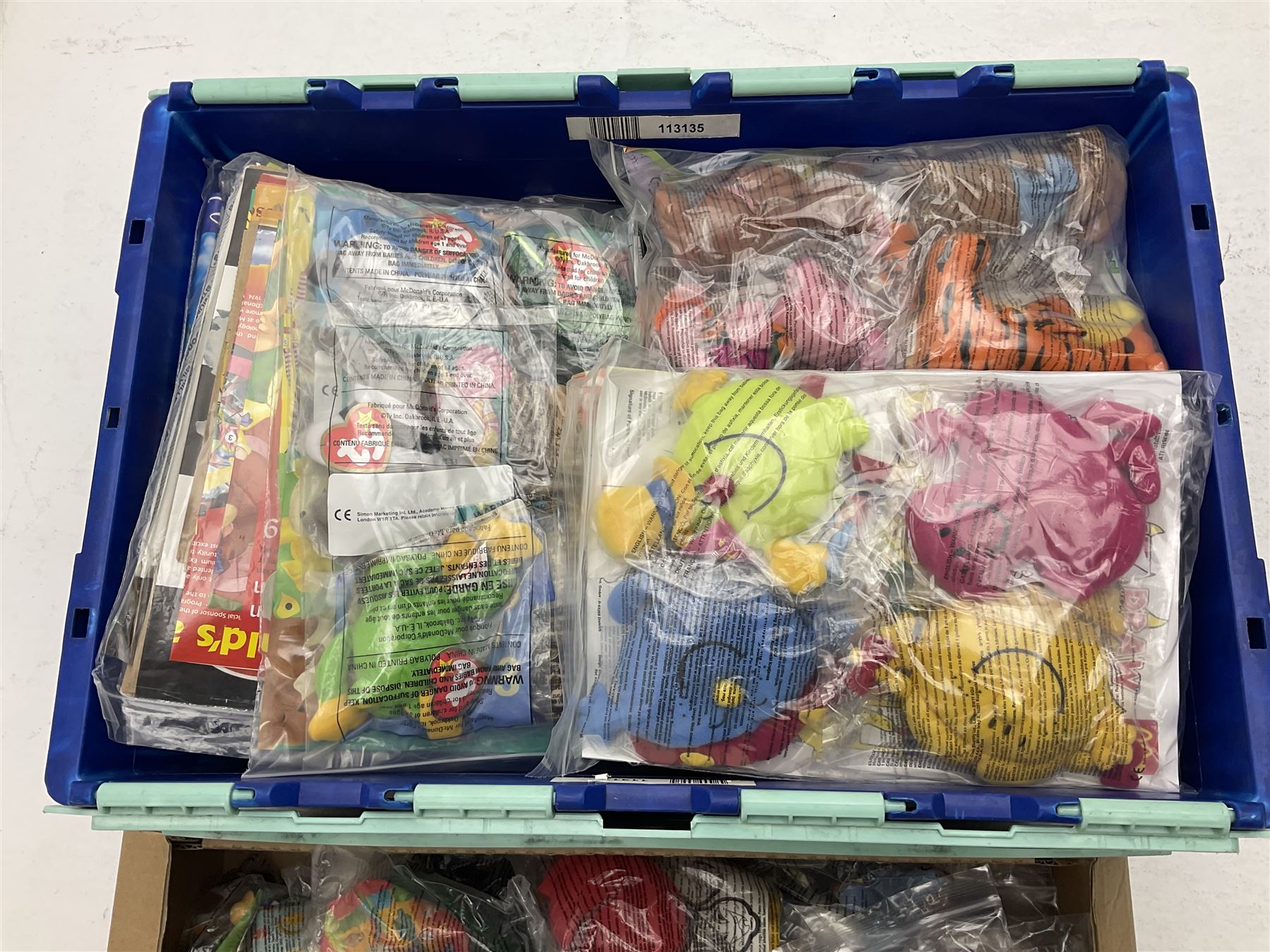 Large quantity of Mcdonalds toys to include The Simpsons in three boxes
