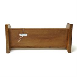 Mouseman - oak book trough, curved end supports, with carved mouse signature, by the workshop of Robert Thompson, Kilburn W45.5cm