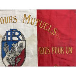 French State Police banner as the tricolor flag embroidered with coloured and metallic thread 'Societe De Secours Mutuels Un Pour Tous Tous Pour Un De La Police D'Eteat De Marseille' to one side; plain flag verso; tassels to three sides 100 x 113cm
