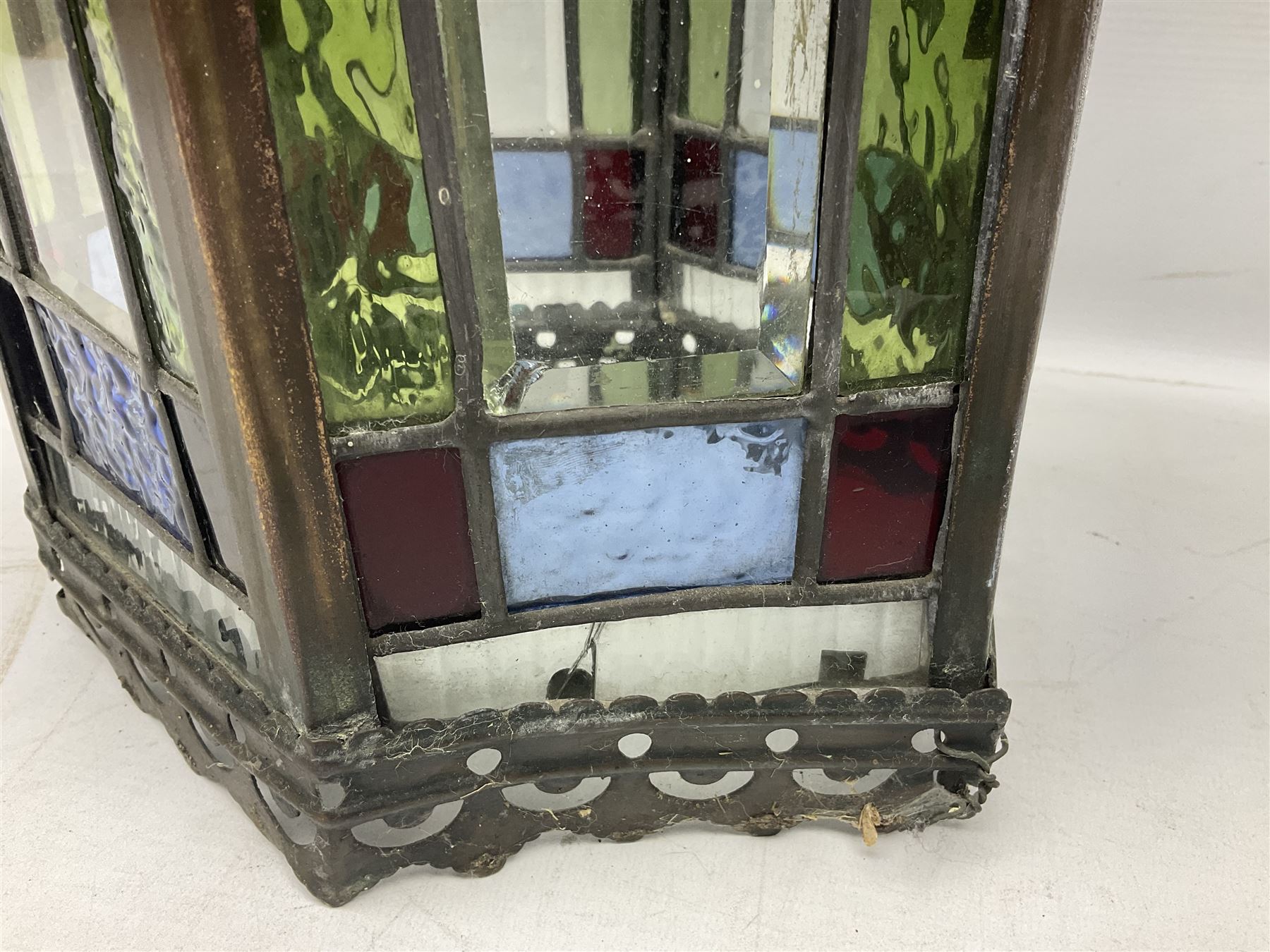 Victorian brass and stained leaded glass hall lantern, of hexagonal form, supported by four domed arms and pierced fret, H46cm W20cm