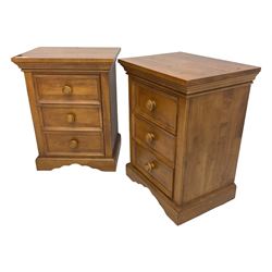 Pair of contemporary cherry wood bedside chests, rectangular top and projecting moulded cornice over three drawers, on plinth base with shaped apron