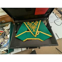 Collection of Masonic jewels and regalia, including robes, sashes, gloves, medallions, etc, in a number of briefcases and boxes