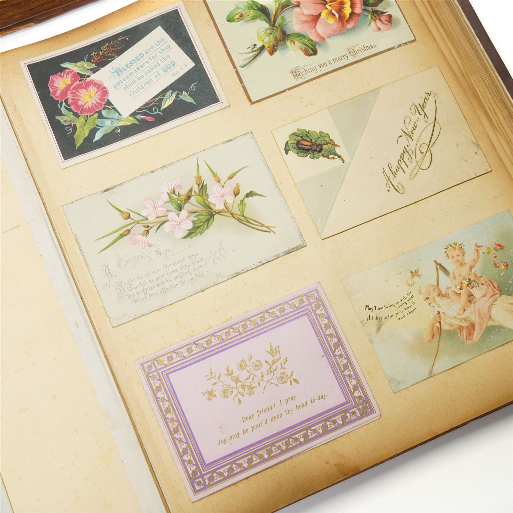 Victorian greetings card album and a scrap book with military and other scraps (2)