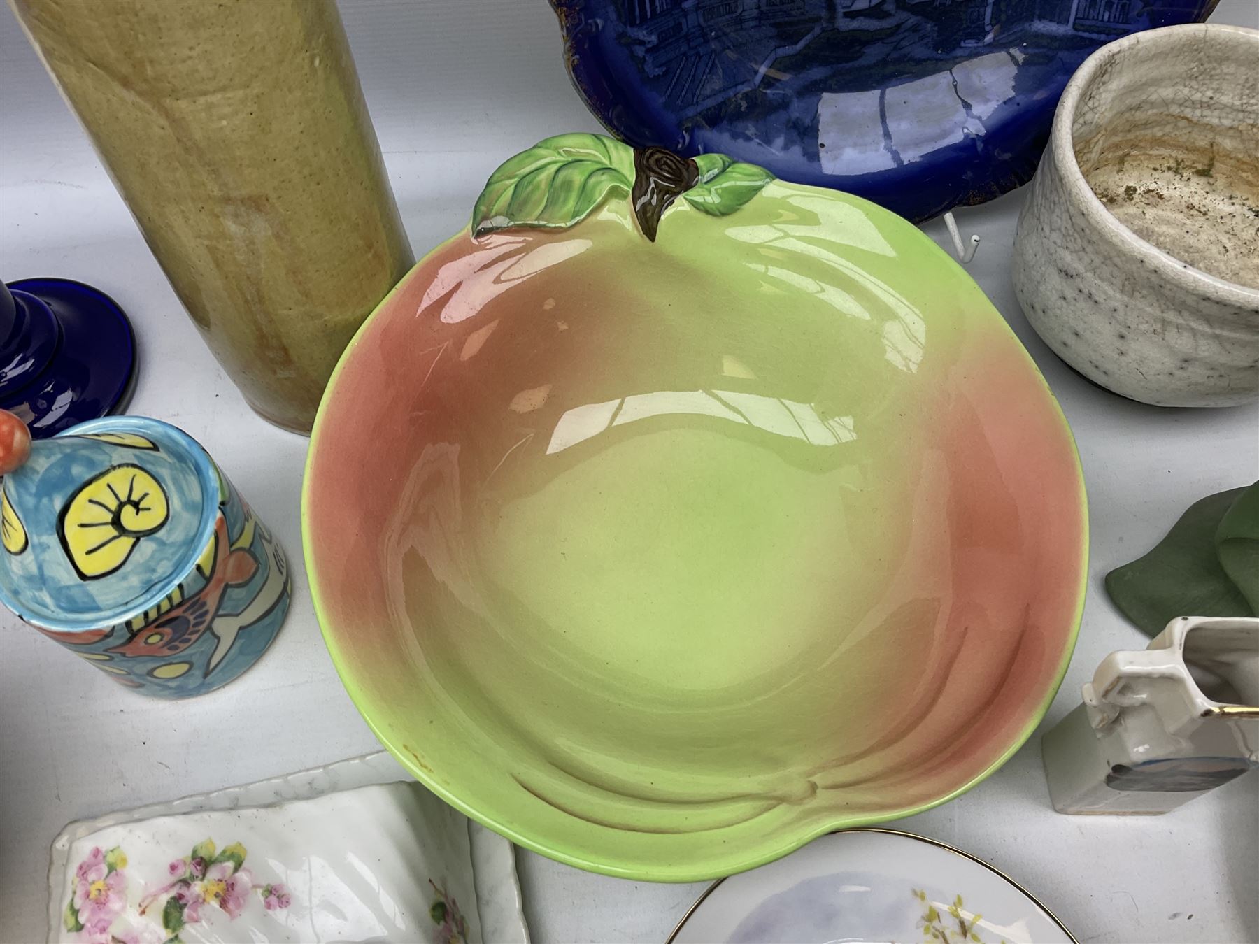 Carlton Ware bowl in the form of an apple, together with a pair of ceramic wall baskets, West Germany vase, and other collectables, in two boxes 