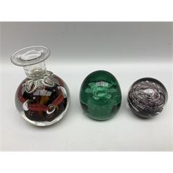 Victorian green glass dump paperweight with internal foil flower decoration, together with other figural and stylised animal paperweights to include Mats Jonasson Maleras seal paperweight, Wedgwood bear, swan examples, Baccarat style examples, captured bubble and cane examples, art glass vases etc