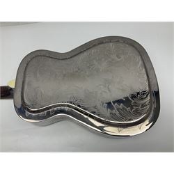 Ozark metal cased resonator guitar with all over chased foliate decoration to the polished finish and mother-of-pearl inlay to the fretboard L100cm; in Stagg hard carrying case