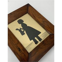 A Victorian silhouette depicting a young girl holding a doll, within rosewood frame, overall H20.5cm L17.5cm.