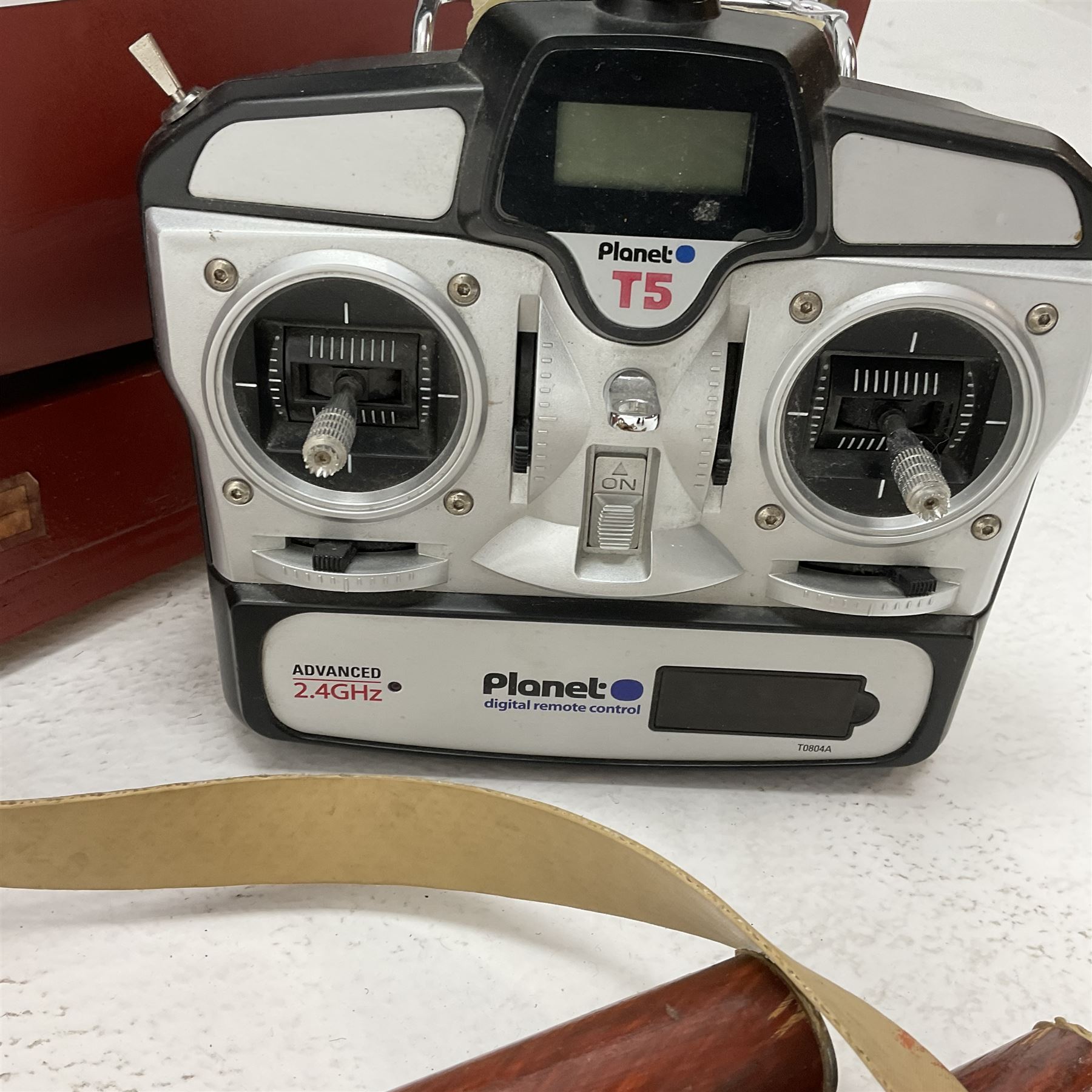 24-Volt radio controlled model of the American tug boat 'Jo-Jo' with full range of deck fittings, transmitter, remote control, receivers and two launching straps, displayed on wooden stand L103cm