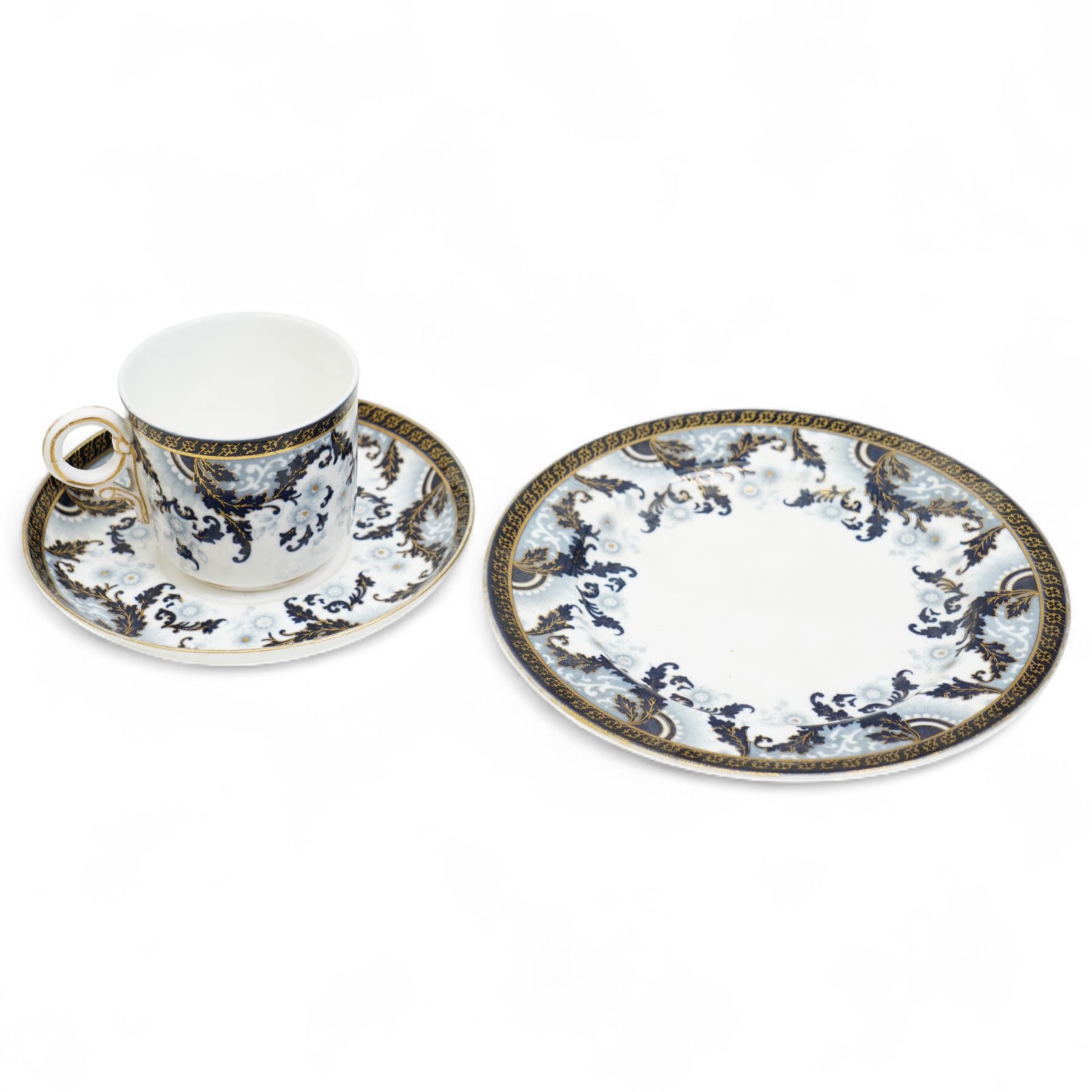 Late Victorian Royal Worcester trio of cup, saucer and plate decorated in dark blue and gilt, retailed by Henry Greene & Sons, London Bridge, two other Worcester trios and three other Worcester items