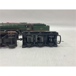 Hornby ‘00’ gauge - four steam locomotives comprising Britannia Class ‘Britannia’ 4-6-2 no.70000 in BR green; Britannia Class ‘Oliver Cromwell’ 4-6-2 no.70013 in BR green; Princess Class 4-6-2 no.6201 in LMS crimson; Coronation Class ‘Duchess of Sutherland’ 4-6-2 no.6233 in LMS crimson; one further tender (5) 