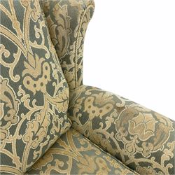 Quality traditional design armchair and footstool, upholstered in embossed fabric
