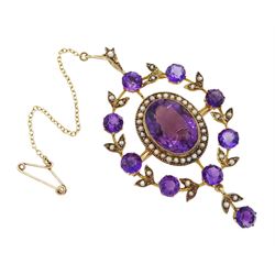 Edwardian gold amethyst and seed pearl pendant/brooch, the central milgrain set cluster with laurel leaf surround, set with amethysts and pearls