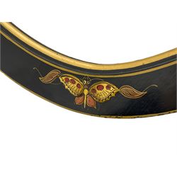 Early 20th century Chinoiserie lacquered oval wall mirror, the frame with raised gilt decoration depicting traditional pagoda scenes and butterfly motifs, bevelled plate