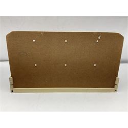 Late 1950s continental red and white painted wooden diorama of a grocery shop interior with fitted shelves and drawers and freestanding 'glazed' counter, fully stocked with miniature tin cans and packets of food L42cm H23cm D22cm