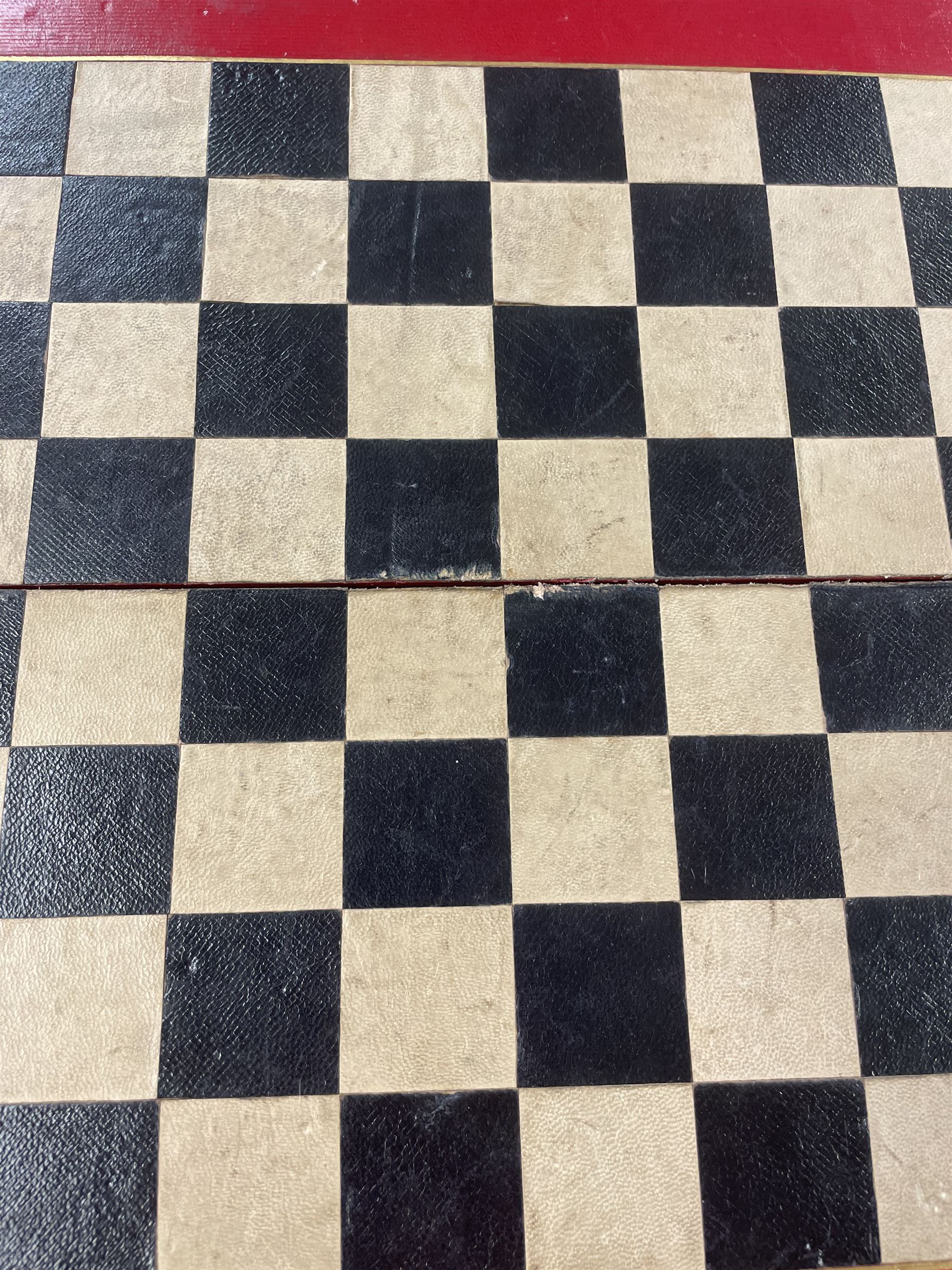 19th century walnut and brass bound games compendium box, painted to enhance the grain, of rectangular form, the hinged opening cover with rounded sides, central brass cartouche with engraved lion crest, and brass riveted straps, opening to reveal a red leather and blue silk lined compartmented interior, with fold-down games board, and lift-out tray containing playing cards, ebony turned dice towers, white and red stained bone draughts, and chess pieces, ivory dice, and ivory and ebony whist markers, and brass bezique board, cribbage board and markers, H15cm W32cm D24cm
This lot has been registered for sale under Section 10 of the APHA Ivory Act