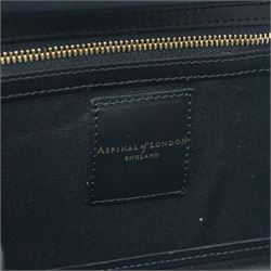 Aspinal of London black leather structured top-handle handbag with gold-tone metal mounts and corner protectors, the hinged lid opening to a fabric-lined interior fitted with a zip pocket and slip compartment, leather brand label stamped Aspinal of London England, fitted with a detachable adjustable leather shoulder strap, accompanied by an Aspinal of London dust bag and presentation box, W19cm D8cm H16cm