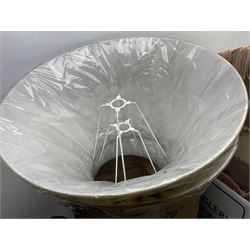 French Adrian helmet and cow horn gong stand; and quantity of lamp shades, etc, helmet H47cm