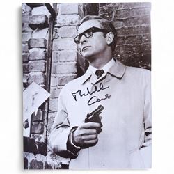 Michael Caine signed books and photographs, comprising 'The Elephant of Hollywood' autobiography and 'Blowing the Bloody Doors Off and Other Lessons in Life', black and white still from Funeral in Berlin and Sunday Times Magazine feature 'Caine on Caine'
