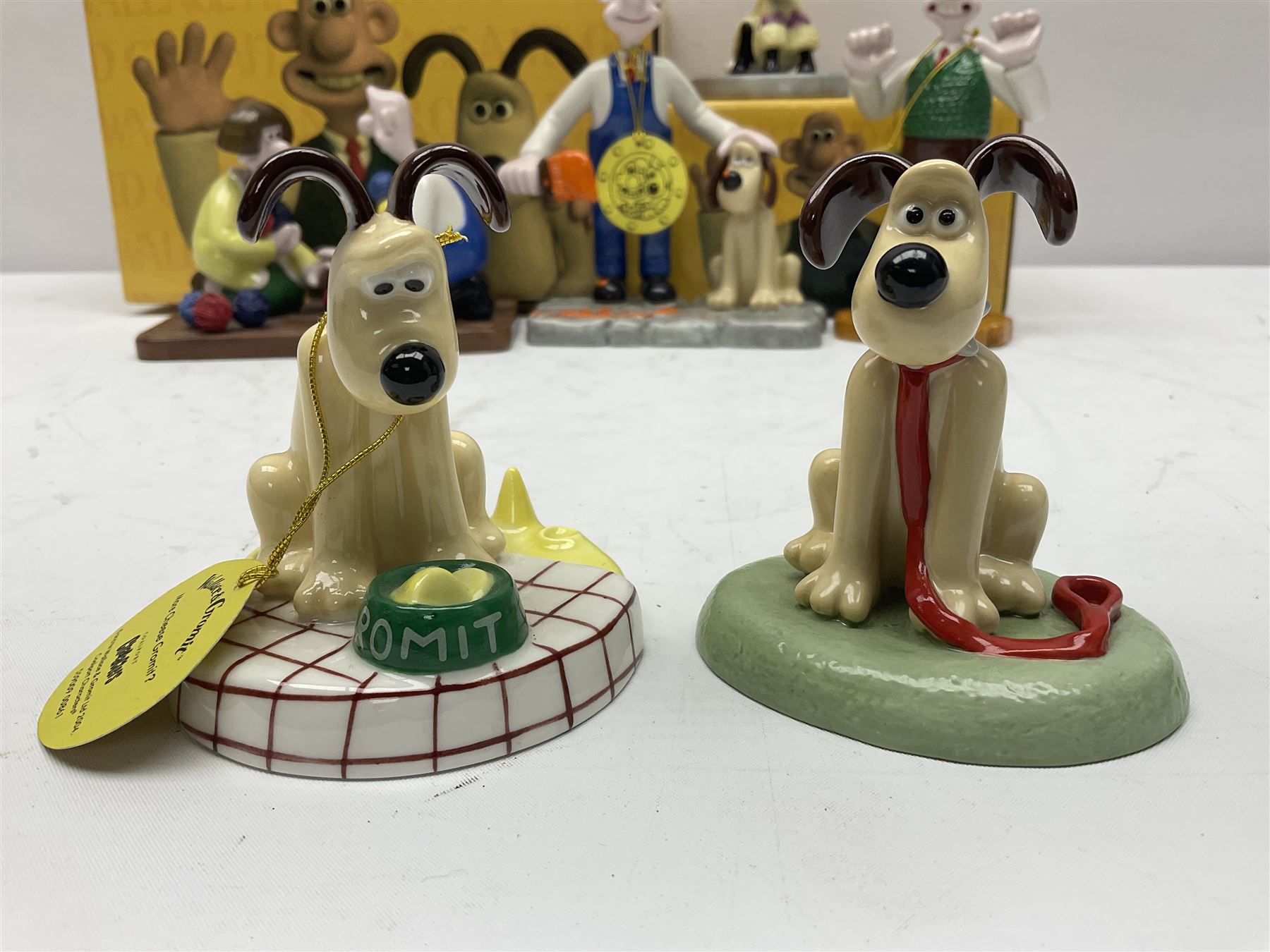 Six Coalport Characters Wallace and Gromit figures, comprising Ready for Takeoff, Woolshop Encounter, Do Something Gromit, Shaun's New Coat, More Cheese Gromit and Happy Birthday Gromit, two with original boxes 