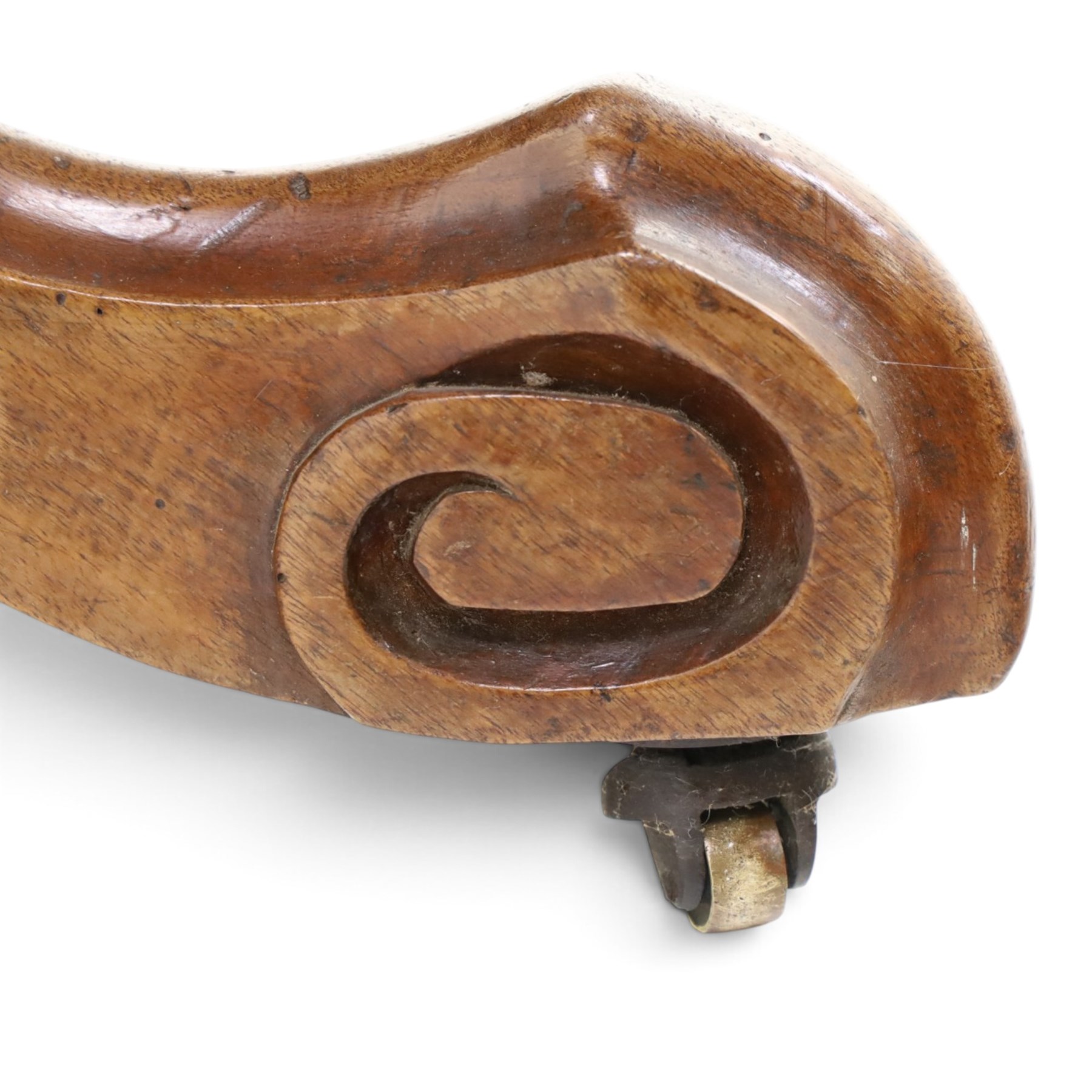 Victorian figured and burr walnut loo table, oval book-matched veneer top with moulded edge, over a turned octagonal pedestal terminating to four splayed supports with flowerhead carved knees and scroll feet with castors