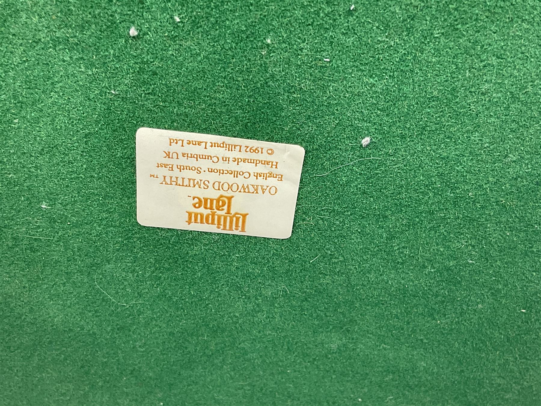 Three Lilliput lanes, comprising Oakwood Smithy, Anne of Cleves and Bluebell Farm, all with deeds and original boxes 