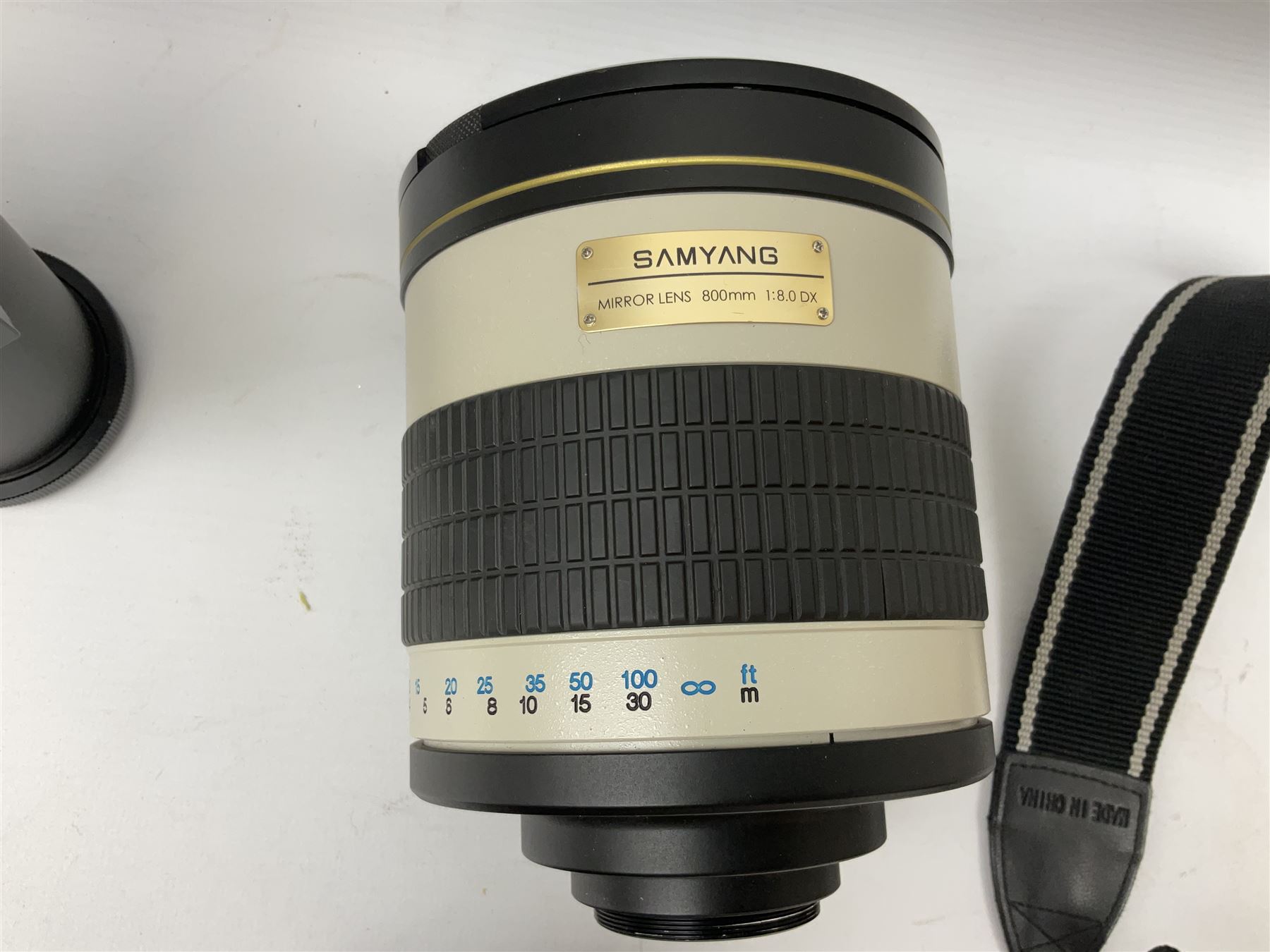 Three Olympus Camera bodies, comprising of OM-D E-M5, E-400 and E-450,   together with 'Samyang Mirror Lens 800mm 1:8.0DX', Olympus 'Zuiko Digital 40-150mm 1;3.5-4.5mm' lens, three other lenses and Velbon CX444 tripod 