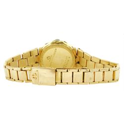 Baume & Mercier Riviera ladies 18ct gold quartz wristwatch, champagne dial with baton hour markers and date aperture, on 18ct gold link bracelet, stamped 750 and hallmarked, boxed with guarantee dated 1985