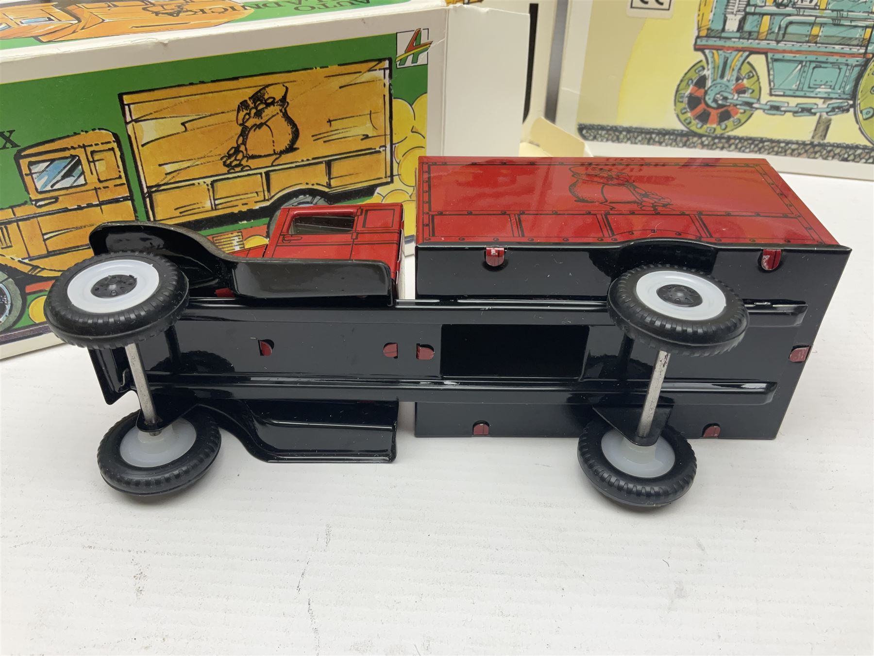 Kovap - eleven tinplate models to include Tractor and Trailer, Road Roller 1927, Moving Moneybox 1924, Hawkeye type B 1924, Boy on a Tricycle; all in original boxes 
