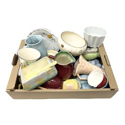 Two Beswick jugs decorated with palm trees, together with matching wall pockets, and similar ceramics, together with six Shelley dishes  