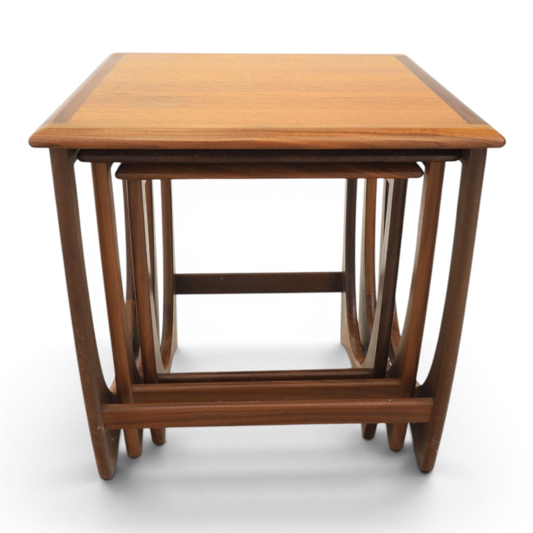 G-Plan - 'Astro' teak nest of three tables, square top with shaped supports