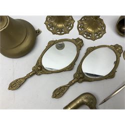 Pair of brass candle sticks, together with brass bell, walking stick handle, mirrors and other brassware 