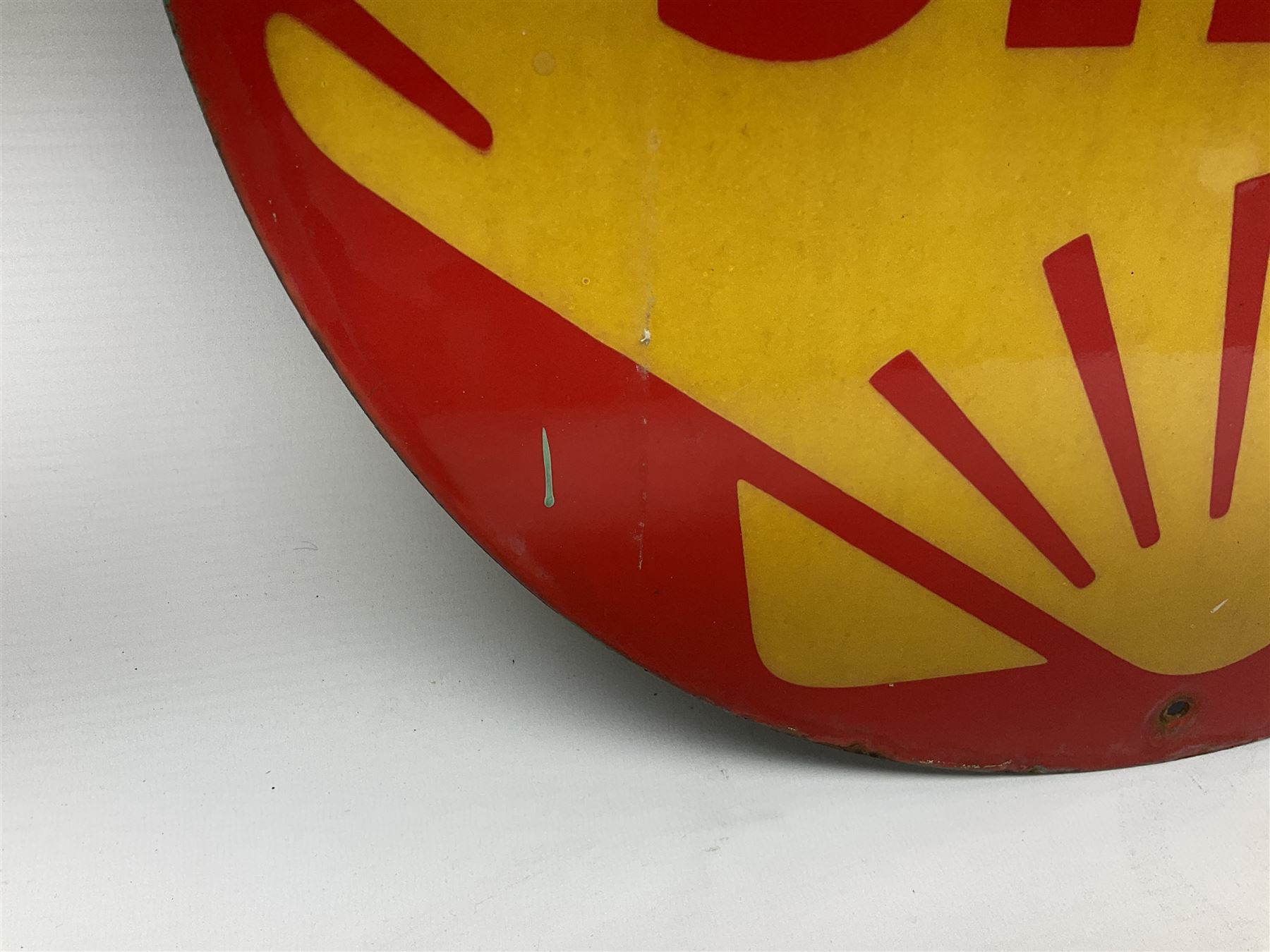 Circular enamelled red and yellow sign depicting Shell logo and text, D40cm