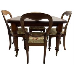 Victorian mahogany dining table, telescopic extending action, moulded rectangular top with rounded corners, single additional leaf, on turned and fluted supports with brass and ceramic castors; and a set of four Victorian mahogany dining chairs, balloon back over upholstered drop-on seat in floral pattern fabric, on turned front supports 