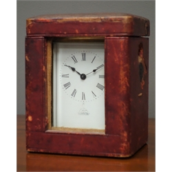  Early 20th century brass carriage clock in leather travelling case  