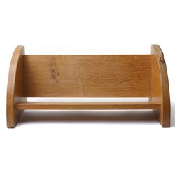 Mouseman - oak book trough, curved end supports, with carved mouse signature, by the workshop of Robert Thompson, Kilburn W45cm